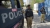 A spokesman said the police vehicle was on a routine patrol when it came under attack.