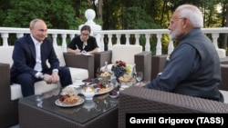 Indian Prime Minister Narendra Modi (right) and Russian President Vladimir Putin at talks in Moscow earlier this month