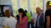 Vagif Khachatrian and other patients from Nagorno-Karabakh pass through an Azerbaijani checkpoint in the Lachin corridor, July 29, 2023.