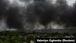 Дим над Харковом через російський обстріл, 17 травня 2024 року