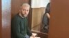 Sergei Vedel appears in court in Moscow in April 2023.