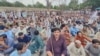 Residents of Pakistan's Khyber Pakhtunkhwa Province protest against a lack of security in the region in a June 15 demonstration that condemned both the government and extremists.