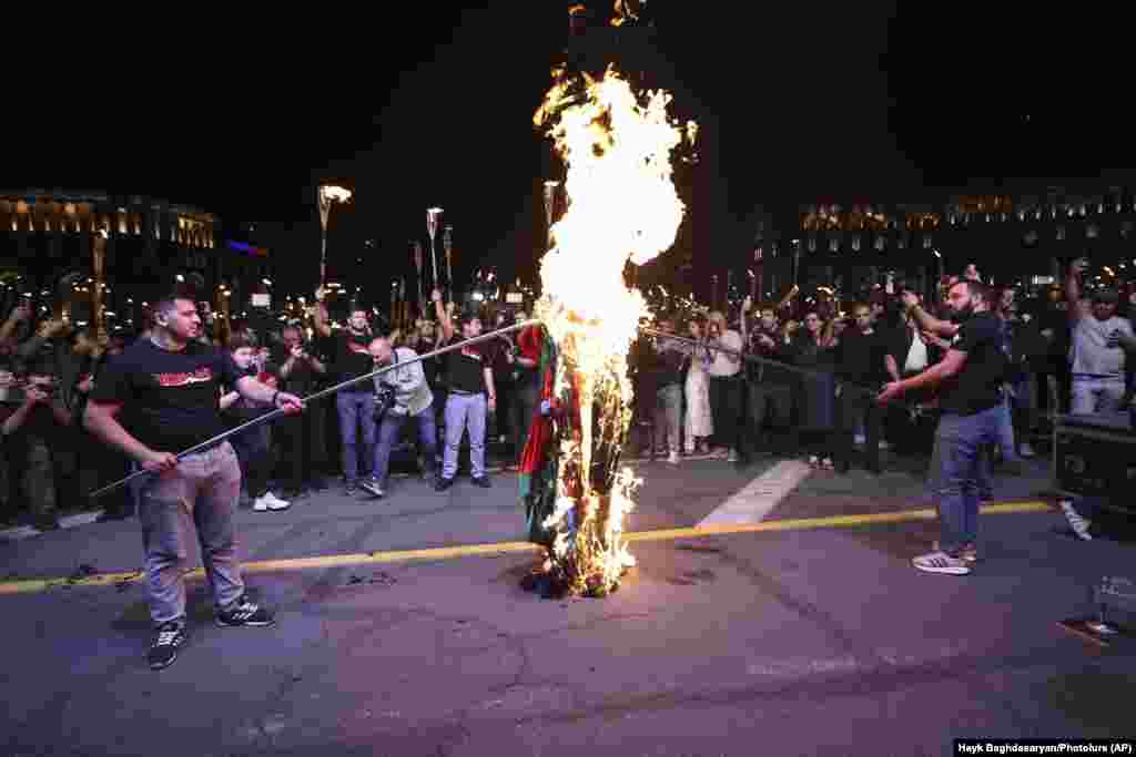 Turkish and Azerbaijani flags were set alight in the nation's capital. A century later, recognition of the killings as genocide is still a divisive diplomatic issue, with Turkey and Azerbaijan -- who share strong ethnic and cultural ties -- officially denying genocide took place. 