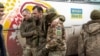 Ukrainian prisoners of wars after a prisoner swap with Russia at an unknown location in Ukraine (file photo)