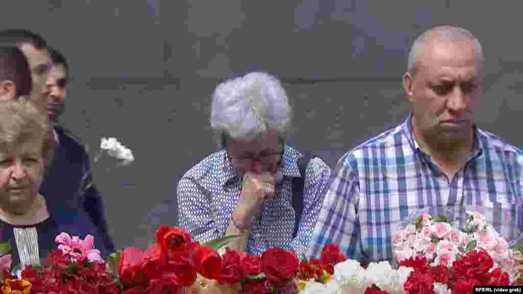 A woman cries after laying a handful of red roses. As of 2023, 31 UN member states recognize the 1915 events as genocide. Turkey claims that the number of deaths has been inflated and that those killed were victims of civil war and unrest. However, many scholars view the mass killings as the first genocide of the 20th century. 