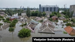 Затоплена після пошкодження Каховської ГЕС територія в Новій Каховці, 7 червня 2023 року