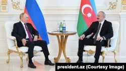 Рускиот претседател Владимир Путин со азербејџанскиот претседател Илхам Алиев Алиев, 18 јуни 2024 г.