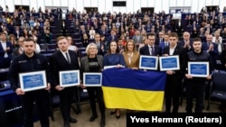 European Parliament President Roberta Metsola (fourth from right) with members of Ukrainian society who took receipt of the Sakharov Prize in Strasbourg on December 14.