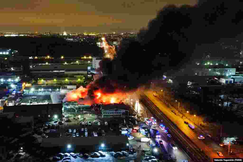 December 3: A car center ablaze in St. Petersburg. The center was a hub for car parts, tire shops and mechanics' stores. 