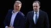 Поранешниот македонски премиер Никола Груевски и поранешниот шеф на македонската тајна полиција Сашо Мијалков. 