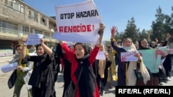 Protesters march against the recent attack in Kabul on October 1.