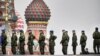 Recruții ruși stau în Piața Roșie din centrul Moscovei pe 29 septembrie 2022, în urma anunțului lui Vladimir Putin pentru mobilizarea parțială decretată de Vladimir Putin. 