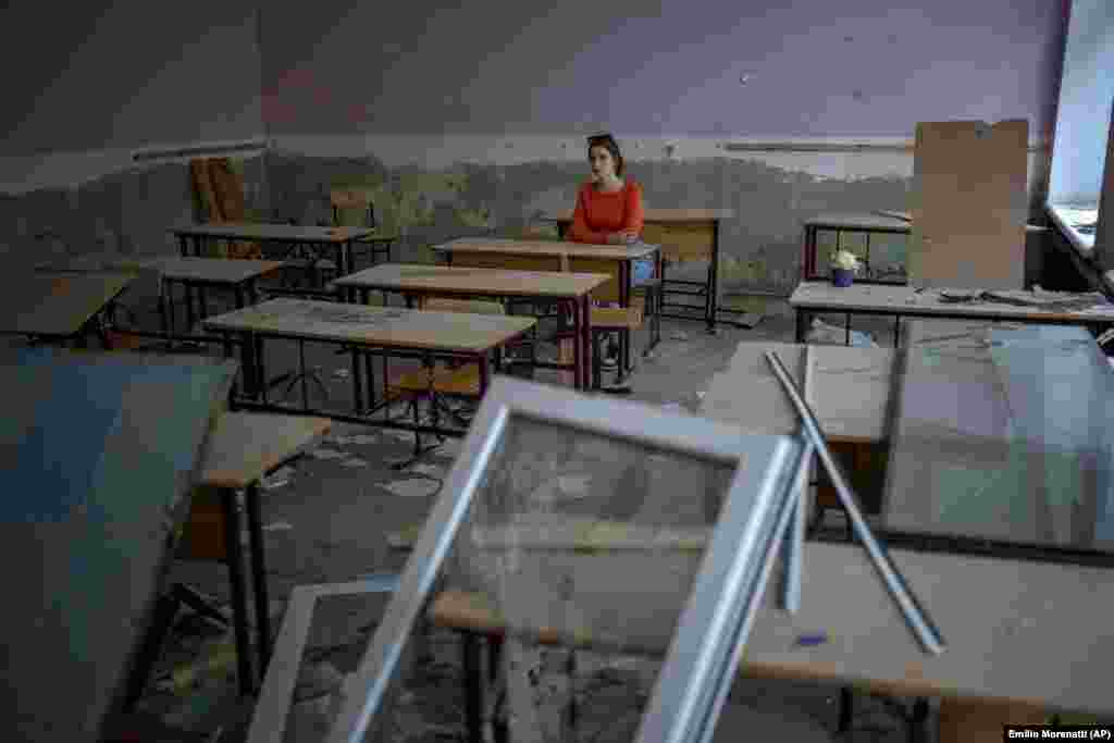 "At first, I was scared to come to the school after it was bombed. For a long time, I was just looking at it from a distance. At those moments, it seemed like nothing ever happened," said Sofia Zhyr, 14, whose classmate died during the shelling. 