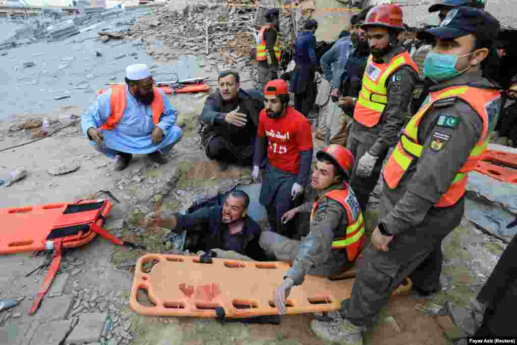 Rescuers plead for assistance as they scramble to find survivors under the collapsed roof. Prime Minister Shahbaz Sharif said "stern action" would be taken against those who were behind the bombing. 