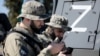 Военнослужащие во время смотра сил чеченских военных подразделений на территории резиденции главы Чечни, 29 марта 2022 года. Иллюстрационное фото