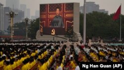 КИНА - Кинескиот претседател Си Џинпинг зборува за време на церемонијата по повод 100-годишнината од основањето на владејачката кинеска комунистичка партија на плоштадот Тјенанмен во Пекинг. 1 јули 2021 година.