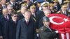 For years, Turkish leader Recep Tayyip Erdogan (3rd L) and his foreign minister (later prime minister) Ahmet Davutoglu (2nd L) pursued a policy of not antagonizing its neighbors. However, this all began to unravel around the time of the Arab Spring.