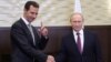 Сириянын президенти Башар Асад менен Орусиянын президенти Владимир Путин. 