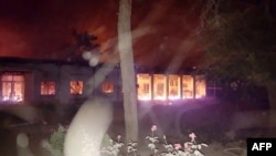 In this photograph released by Doctors Without Borders (MSF), fires burn in part of the MSF hospital in the Afghan city of Kunduz after it was hit by an air strike on October 3.