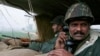 Indian Border Security Force soldiers keep watch from a bunker near the fenced border with Pakistan. (file photo)