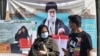 بنری در خیابان انقلاب تهران که برای تشویق مردم به شرکت در انتخابات نصب شده است
