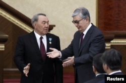 Нурсултан Назарбаєв (ліворуч) та Касим-Жомарт Токаєв, 2019 рік