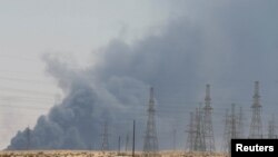 Smoke billows into the sky following a massive blaze at the Abqaiq oil-processing facility in Saudi Arabia on September 14.