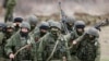 Окупація українського Криму. Російські військові без розпізнавальних знаків (так звані «зелені чоловічки») у селі Перевальне, 5 березня 2014 року