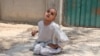 Ten-year-old Qudratullah cannot walk, run, or talk because he is a victim of polio virus.