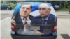 Likovi predsjednika Rusije Vladimira Putina (D) i Republike Srpske Milorada Dodika (L), predizborna kampanja za opšte izbore u BiH, septembar 2014.