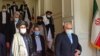 دیدار وزیر خارجه ایران (راست) با ملا عبدالغنی برادر (چپ) در تهران