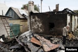Зруйнований внаслідок обстрілу будинок у Донецьку. 17 серпня 2015 року