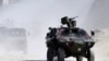 Turkish troops patrol in Hakkari province, near the Iraqi border, on June 19.