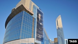 Russian President Dmitry Medvedev unveils the monument to Boris Yeltsin in the Urals city of Yekaterinburg.