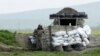 Nagorno-Karabakh -- An ethnic Armenian soldier stands guard at the checkpoint near Nagorno-Karabakh's town of Martuni, April 8, 2016