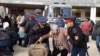 Полицейские задерживают участников акции протеста в Астане. Иллюстративное фото.