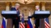 Дональд Трамп и Владимир Путин на саммите в Хельсинки, 16 июля 2018 года