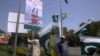 Pakistani and Kashmiri flags are displayed around Lahore, Pakistan, ahead of nationwide anti-India protests. 