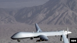 A U.S. military photo shows an MQ-1 Predator drone aircraft over an undisclosed location.