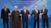 Left to right: Azerbaijani President Ilham Aliyev, Iranian President Hassan Rohani, Kazakh President Nursultan Nazarbaev, Russian President Vladimir Putin, and Turkmen President Gurbanguly Berdymukhammedov pose after the signing ceremony for a new convention on the status of the Caspian Sea on August 12. 