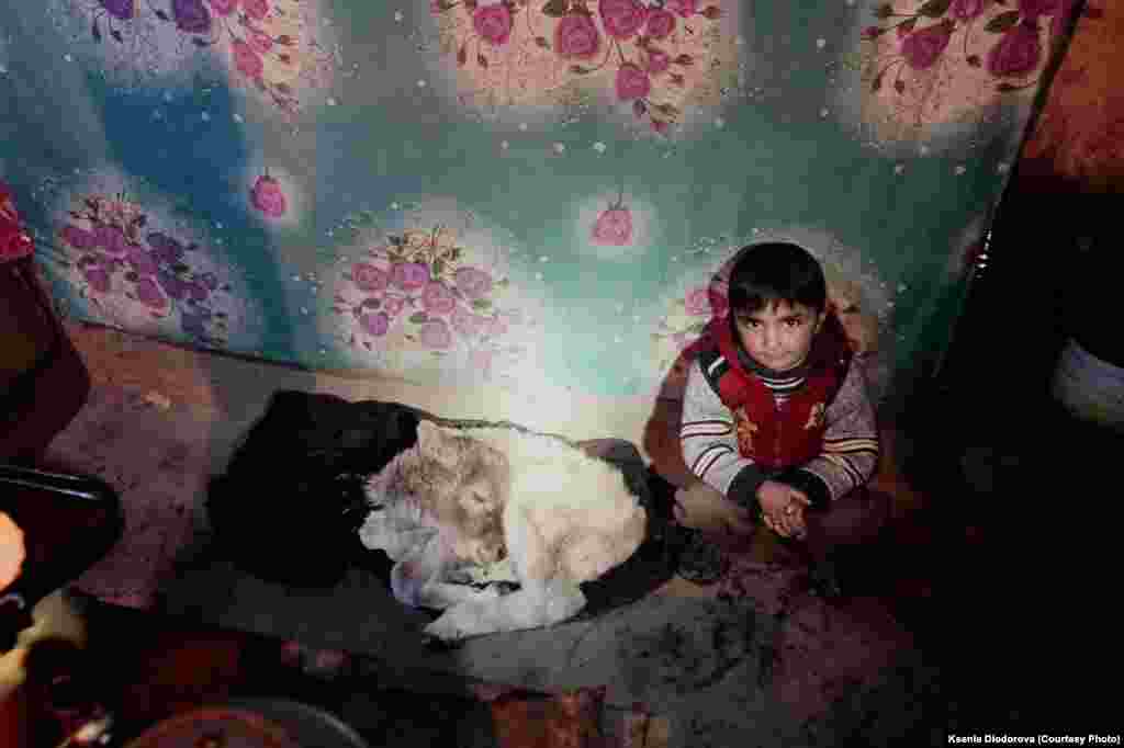 Dzhuma's nephew is afraid of the dark. There are two light bulbs in his home, one of which is powered by a small solar panel and left on all night. Almost all houses in Roshorv are equipped with solar panels, purchased as part of a EU initiative. Power supply to the village otherwise is very poor; outages happen several times a day. 