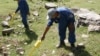 FILE: Sappers use detectors to search for undetonated ammunition in Tajikistan.