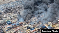 Smoke rises after a massive explosion and fire rocked a port near the southern port city of Bandar Abbas, Iran, on April 26.