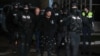 Mercenarul Horațiu Potra (în spate) înconjurat de forțele speciale, pe 8 decembrie 2024, la Ploiești, în ziua în care ar fi urmat să înceapă acțiunea de schimbarea ordinii constituționale.