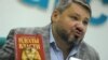 Лидер «Монархической партии» России Антон Баков во время пресс-конференции, посвященной выходу новой книги «Идолы власти». Москва, 16 января 2013 года.