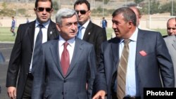 Armenia - President Serzh Sarkisian and businessman Ruben Hayrapetian (R) visit a football academy in Yerevan, 1Sep2010.