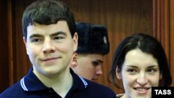Nikita Tikhonov (left) and his partner Yevgenia Khasis have been charged with the double murder of Stanislav Markelov and Anastasia Baburova