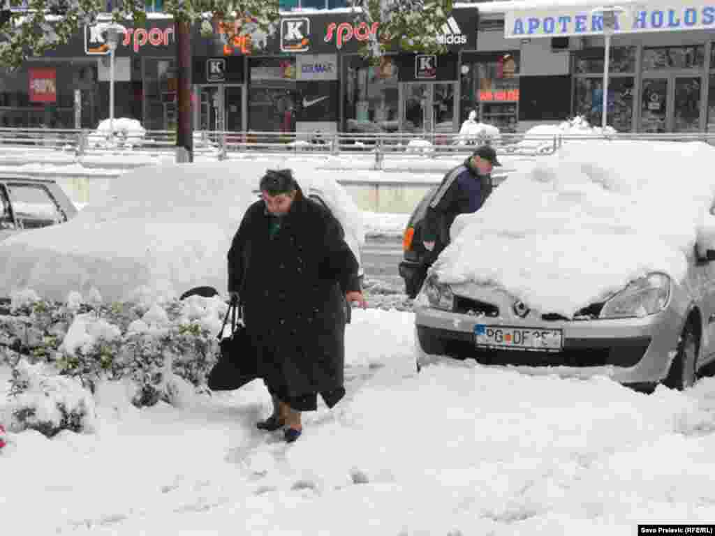 Residents of Montenegro's capital, Podgorica, dig out after a recent snowfall. The northern parts of the country saw temperatures of -22 Celsius on February 2.