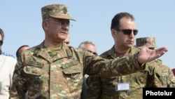 Armenia - Defense Minister Seyran Ohanian (L) and Vigen Sargsian, the chief of the presidential staff, inspect Armenian troops, 11Sep2015.