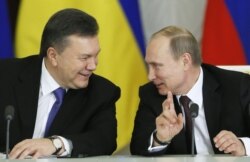 Віктор Янукович, ліворуч, і Володимир Путін (архівне фото)